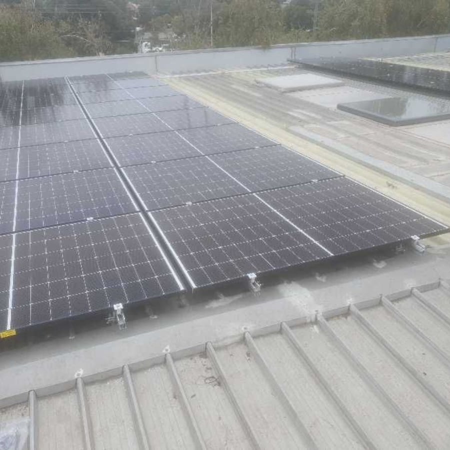 Rooftop solar array across the building
